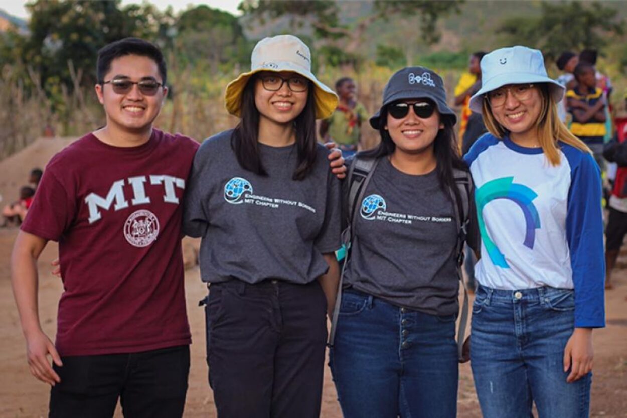 Four MIT students smile in Tanzania