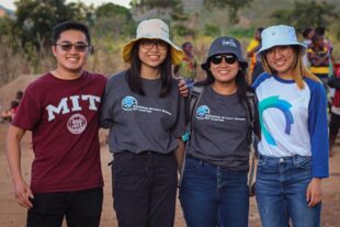 Four MIT students smile in Tanzania