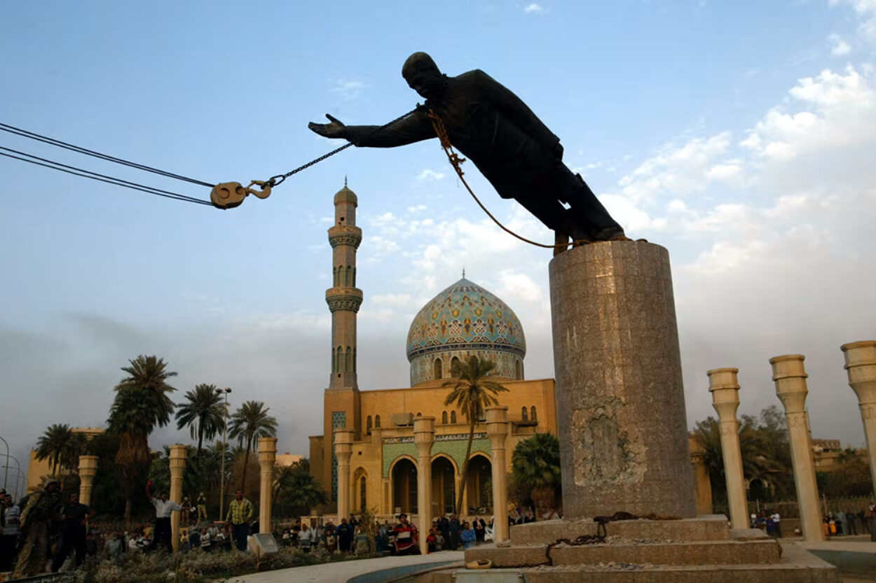 Sassam Hussein statue falling